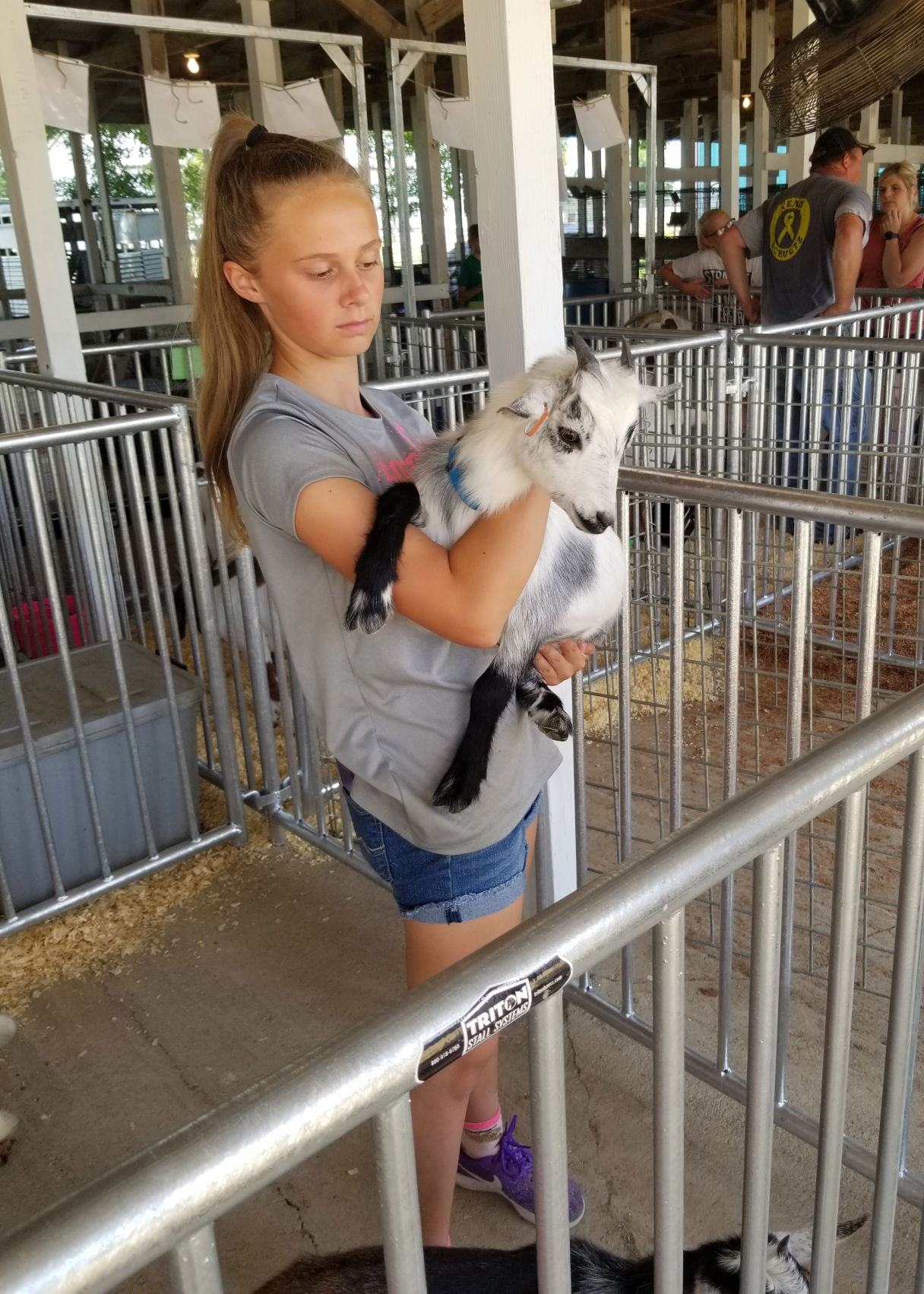 Kylee Greenwood holds her kid